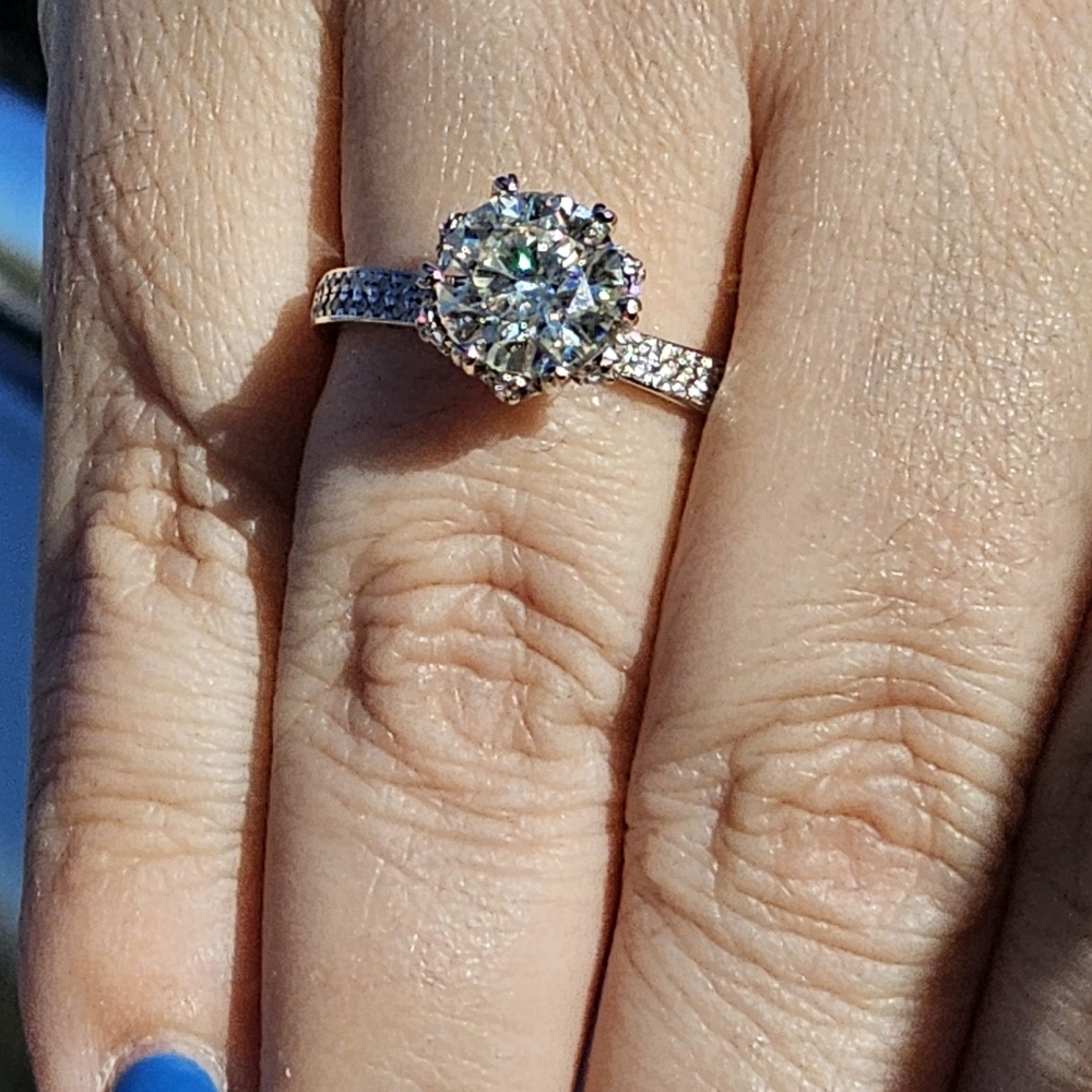 Classic Silver Halo Solitaire Ring with Clear Stone